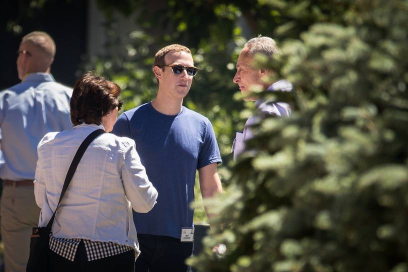 Zuckerberg speaking with Schumer