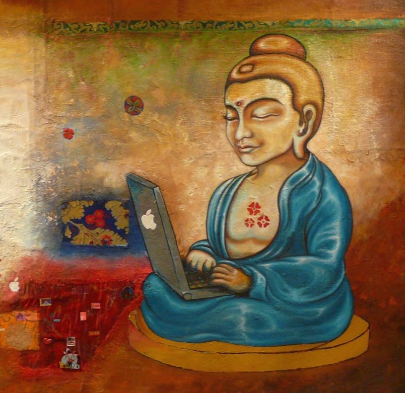 Buddha meditating with Macbook in lap